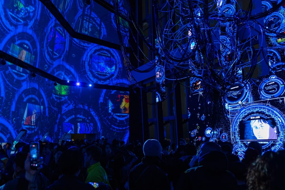 Ghost in the Shell Exhibition – Nerve Net cyber network visualizer installation with multiple circular UI elements displayed across the wall