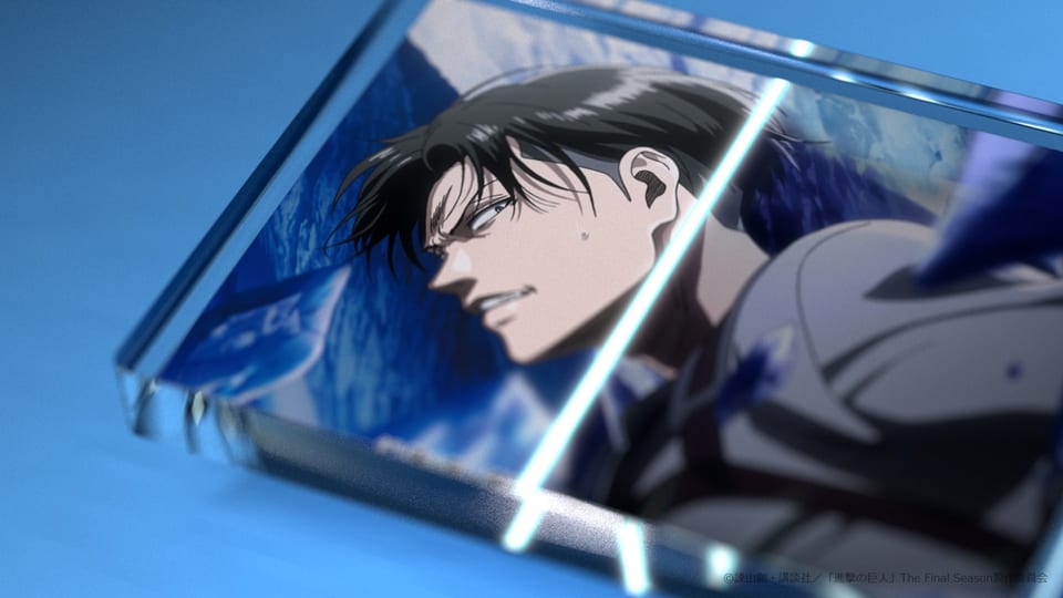 RE:LIGHTING acrylic block scanned by a beam of light in WIT STUDIO’s Attack on Titan merchandise video