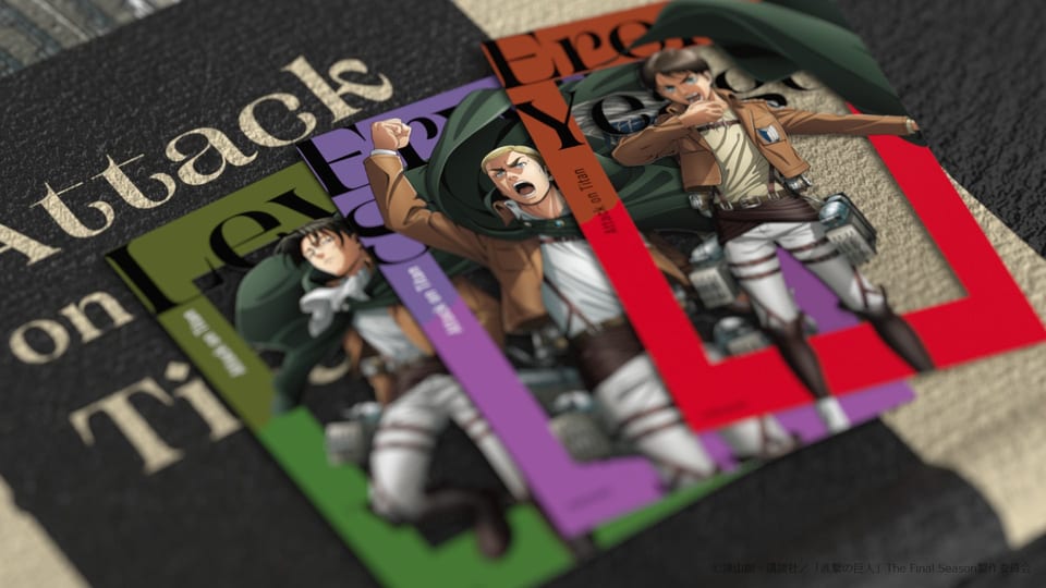 Transparent cards featuring Levi, Erwin, and Eren in WIT STUDIO’s Attack on Titan merchandise video
